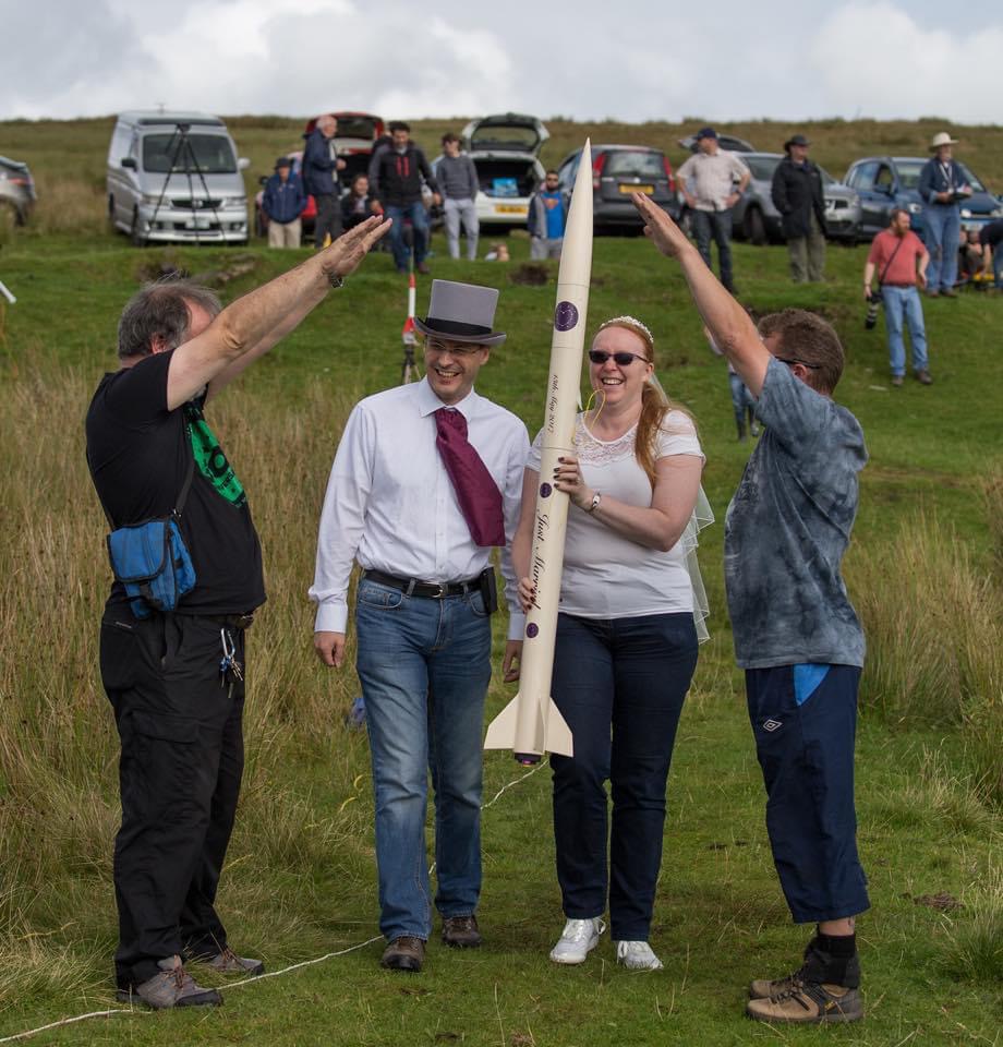 preparing to launch wedding rocket